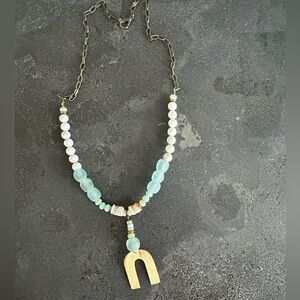 Long necklace. Beautiful light blue glass beads and off white stone beads.